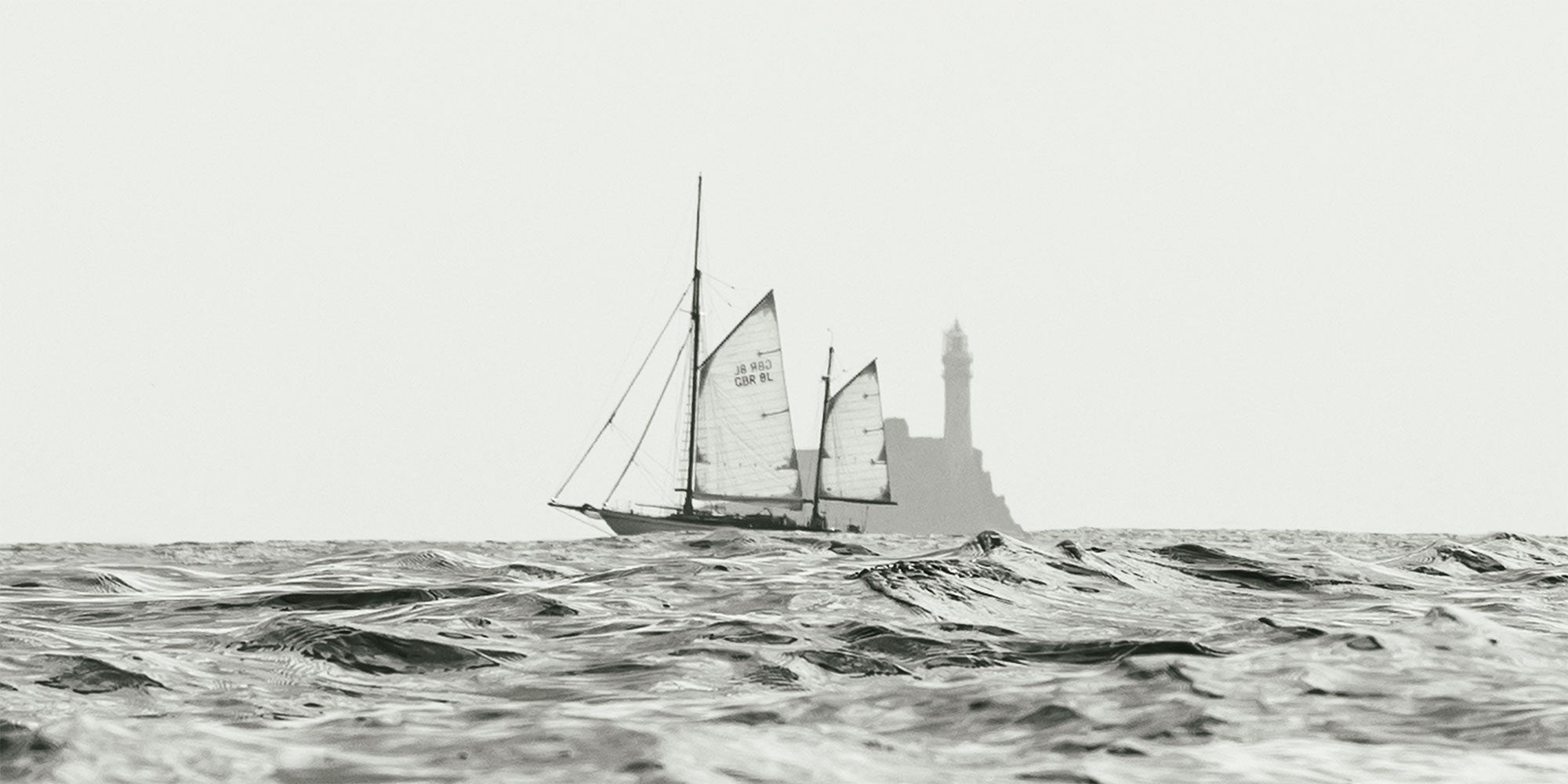 Sailing ship on choppy waters with aighthouse in the background