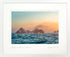 Sunset over ocean with rocky islands, framed artwork
